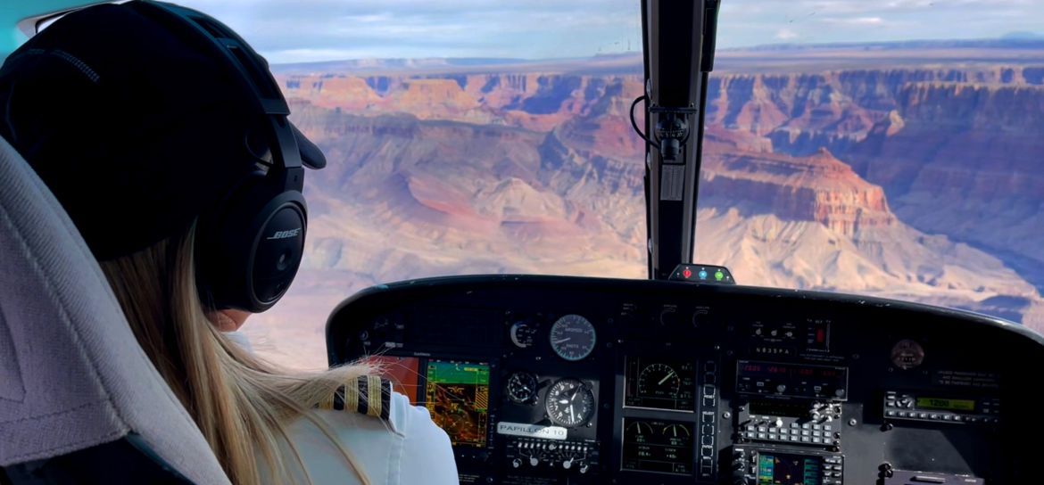 View from front seat of a helicopter tour over grand canyon