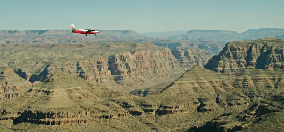 Airplane Las Vegas Trips to the Grand Canyon Catch breathtaking aerial views from an airplane during Papillon's Las Vegas trips to the Grand Canyon