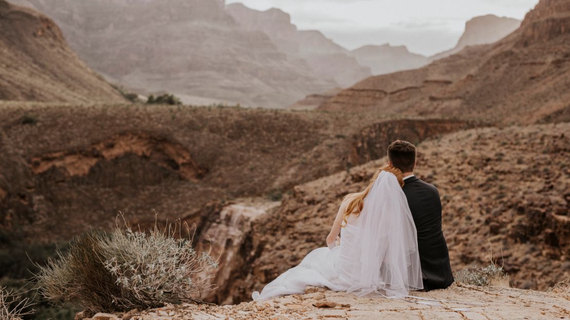 Vegas Grand Canyon Wedding Bride and Groom enjoying the view below the rim of Grand Canyon.