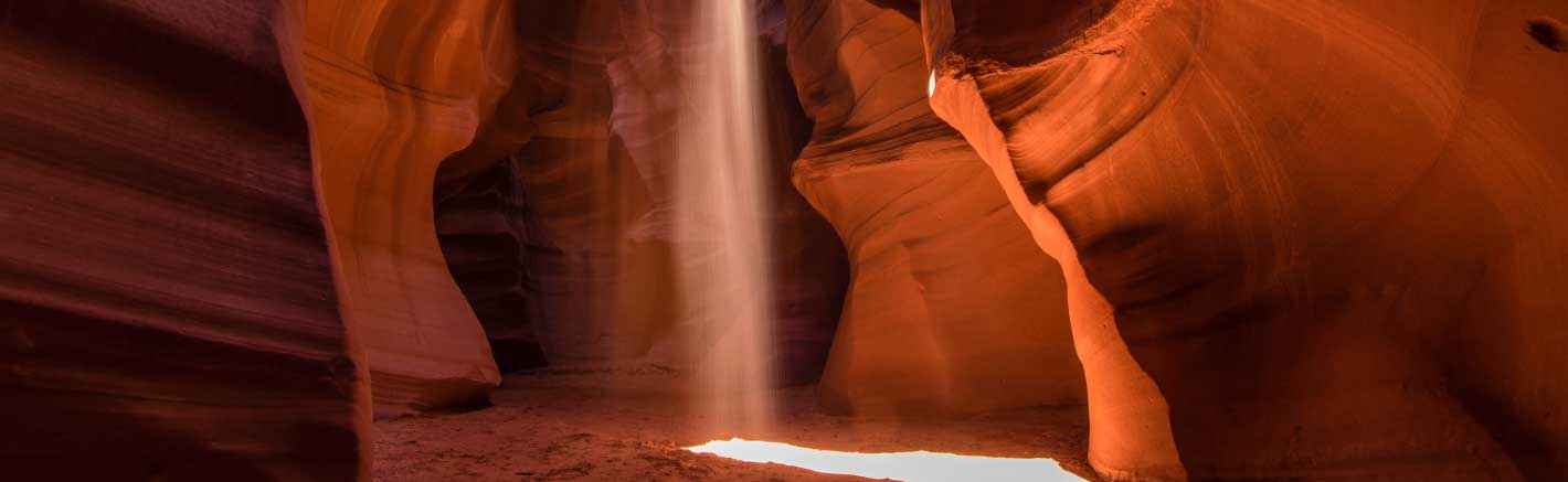 Sun beams filtering through Antelope Canyon