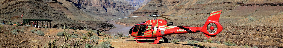 Grand Celebration Helicopter Tour A Papillon helicopter flying over the Grand Canyon as passengers enjoy the discounted Grand Celebration helicopter tour